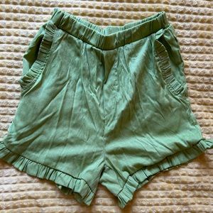 green frilly preppy shorts